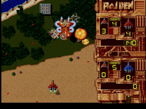 Raiden: Over forest and beach, a red fighter below a large craft and an explosion