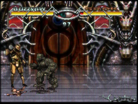 Ultra Vortek: A gold-armoured fighter against a stone-skinned opponent in a gothic hall